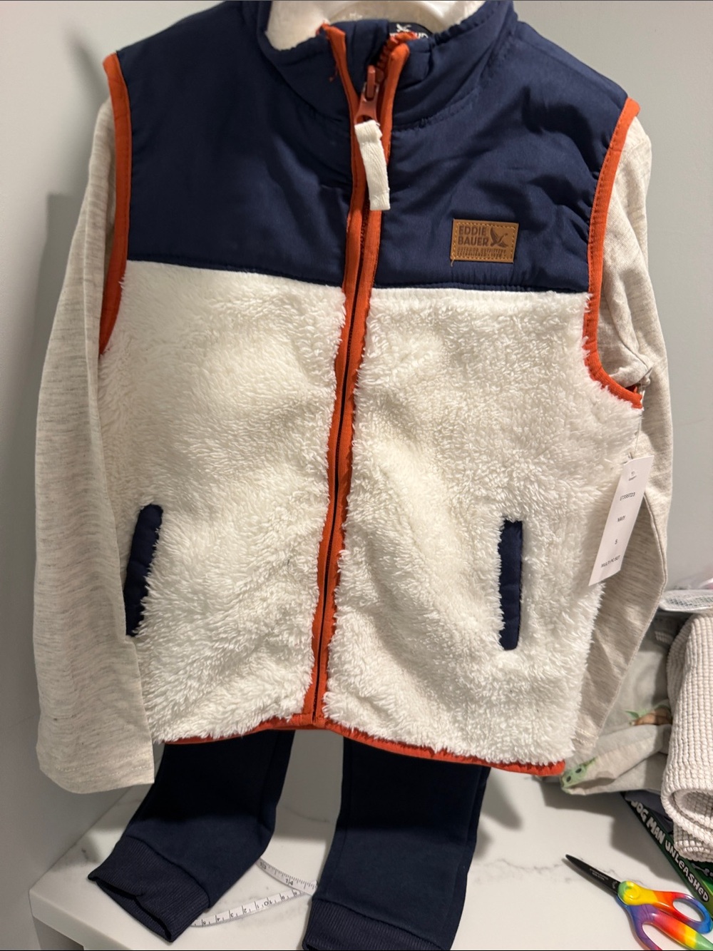 Eddie Bauer Cream Sherpa Vest with Navy Yoke and Orange Trim